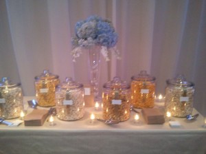 Monica's daughter and new husband had a popcorn bar for their wedding guests with different flavors to sample. It looked beautiful, and the guests loved it!